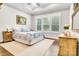 Cozy bedroom with tray ceilings, large windows, and classic decor at 501 Preservation Dr, Fort Mill, SC 29715