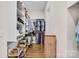 Walk-in closet with custom shelving and ample storage space for clothing and accessories at 501 Preservation Dr, Fort Mill, SC 29715