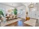 Elegant dining room with hardwood floors, a large wooden table, and plenty of natural light at 501 Preservation Dr, Fort Mill, SC 29715