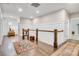 Spacious second-floor hallway with board and batten, hardwood floors, and natural light at 501 Preservation Dr, Fort Mill, SC 29715