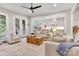 Inviting living room featuring neutral tones, comfortable seating, and an open layout to the kitchen at 501 Preservation Dr, Fort Mill, SC 29715