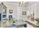 Bright office space featuring a glass-top desk, gray furnishings, and double doors at 501 Preservation Dr, Fort Mill, SC 29715