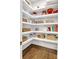 Walk-in pantry with custom shelving, offering ample storage space for kitchen essentials at 501 Preservation Dr, Fort Mill, SC 29715