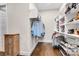 Bright walk-in closet features custom shelves and hanging storage for optimal organization at 501 Preservation Dr, Fort Mill, SC 29715