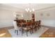 Dining room with decorative lighting, and hardwood floors; seats 10 at 512 Appomatox Dr, Marvin, NC 28173