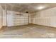 Spacious garage area with an overhead door and concrete flooring at 5205 Raging Creek Dr # 122, Indian Trail, NC 28079