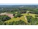 A sweeping birds-eye image of land, featuring healthy trees, meadows, and an open landscape at 5740 Crouse Rd, Crouse, NC 28033