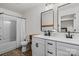 Bright bathroom with dual sinks, modern fixtures, and shower-tub combination at 5740 Crouse Rd, Crouse, NC 28033