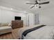 Bedroom featuring wood-look flooring, a ceiling fan, and a seating area at 5740 Crouse Rd, Crouse, NC 28033