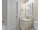 Full bathroom with granite countertop, a marble tiled shower, toilet and storage space at 5811 Gettysburg Dr, Concord, NC 28027