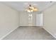 A spacious bedroom featuring neutral paint, plush carpet, and a ceiling fan at 5811 Gettysburg Dr, Concord, NC 28027