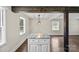 Kitchen island with a marble top and hardwood floors at 5811 Gettysburg Dr, Concord, NC 28027