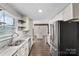 Renovated kitchen with granite countertops and stainless steel appliances at 5811 Gettysburg Dr, Concord, NC 28027