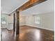 Spacious living room with hardwood floors and modern lighting at 5811 Gettysburg Dr, Concord, NC 28027