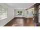 Open living room with hardwood floors and a staircase at 5811 Gettysburg Dr, Concord, NC 28027