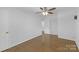 Bedrooms with hardwood floors, ceiling fan, neutral walls, and natural light at 629 Wingrave Dr, Charlotte, NC 28270