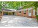 Exterior of home featuring large carport and well-maintained yard at 629 Wingrave Dr, Charlotte, NC 28270