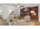Cozy living room with dark wood built-ins, a fireplace, and stylish furnishings at 629 Wingrave Dr, Charlotte, NC 28270