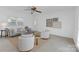 Inviting living room with comfortable seating, neutral colors, and abundant natural light at 629 Wingrave Dr, Charlotte, NC 28270