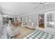 Bright sunroom features tile flooring, dining area, and a comfortable seating area at 629 Wingrave Dr, Charlotte, NC 28270