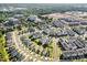 Birds eye view of townhome community with city buildings in the background on a sunny day at 7012 Bryce Ave, Charlotte, NC 28217