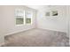 This bright, neutral bedroom offers great natural light at 7012 Bryce Ave, Charlotte, NC 28217