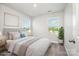 Comfortable bedroom featuring natural light, creating a peaceful and inviting retreat at 7012 Bryce Ave, Charlotte, NC 28217