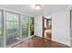 Sunroom featuring many windows and views of the property at 805 S Main St, Mount Holly, NC 28120