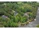 A beautiful aerial view showcasing the approximate lot lines and lake access with dock at 8283 Long Island Rd, Catawba, NC 28609