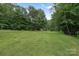 Expansive backyard with lush lawn, perfect for recreation and relaxation at 8283 Long Island Rd, Catawba, NC 28609
