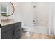 Stylish bathroom with granite vanity, shower-tub, and modern fixtures at 8283 Long Island Rd, Catawba, NC 28609
