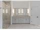 Modern bathroom with double sinks, granite countertops, and a walk-in shower at 8283 Long Island Rd, Catawba, NC 28609