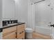 Clean bathroom featuring wood vanity, shower-tub, and bright lighting at 8283 Long Island Rd, Catawba, NC 28609