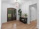 Entryway with a beautiful double door, wood floors, and elegant decor at 8283 Long Island Rd, Catawba, NC 28609