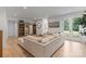 Bright living room featuring a large sectional, built-in shelving, and access to the outdoor area at 8283 Long Island Rd, Catawba, NC 28609