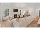 Cozy living room with a fireplace, stylish decor, and large windows at 8283 Long Island Rd, Catawba, NC 28609