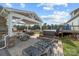 Outdoor area featuring a hot tub, grill, and seating beneath a stylish pergola at 830 John Rainey Rd, Salisbury, NC 28147