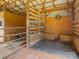 Rustic horse barn interior featuring wooden stalls and a sturdy frame design at 830 John Rainey Rd, Salisbury, NC 28147