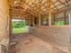 Barn interior with wooden framing, stalls and open-air design allowing for natural light at 830 John Rainey Rd, Salisbury, NC 28147