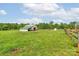 A horse barn is centered on a horse pasture at 830 John Rainey Rd, Salisbury, NC 28147
