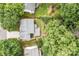 Aerial view of a home with a well-maintained yard surrounded by mature trees at 8700 Fox Tail Ln, Huntersville, NC 28078