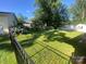 Fenced backyard with a garden and multiple outbuildings at 903 Woodside Dr, Kings Mountain, NC 28086