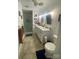 The spacious bathroom boasts a dual-sink vanity, glass shower, and modern fixtures at 903 Woodside Dr, Kings Mountain, NC 28086