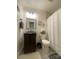 Well-lit bathroom features elegant vanity, toilet, and a framed mirror for a classic look at 903 Woodside Dr, Kings Mountain, NC 28086
