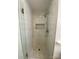 This newly renovated bathroom features a stand up shower with modern tile and accents at 903 Woodside Dr, Kings Mountain, NC 28086