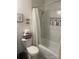 Cozy bathroom featuring a tub, shower combo, and storage niche for a modern living at 903 Woodside Dr, Kings Mountain, NC 28086