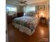 Cozy bedroom with hardwood floors, natural light, and traditional furnishings at 903 Woodside Dr, Kings Mountain, NC 28086