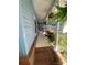 Cozy porch with a seating area, perfect for relaxing with a view of landscaped greenery at 903 Woodside Dr, Kings Mountain, NC 28086