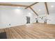 Spacious open concept living and kitchen area with hardwood floors and vaulted ceilings at 9930 Sardis Oaks Rd, Charlotte, NC 28270