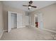 Generously sized bedroom with multiple closets and an attached bath at 10349 Alvarado Way, Charlotte, NC 28277